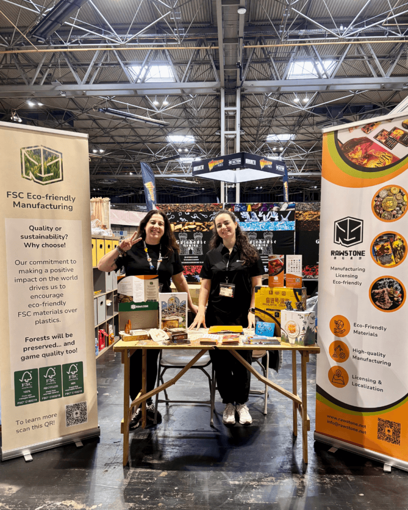 Rawstone team at UKGE25 showcasing sustainable board game manufacturing materials